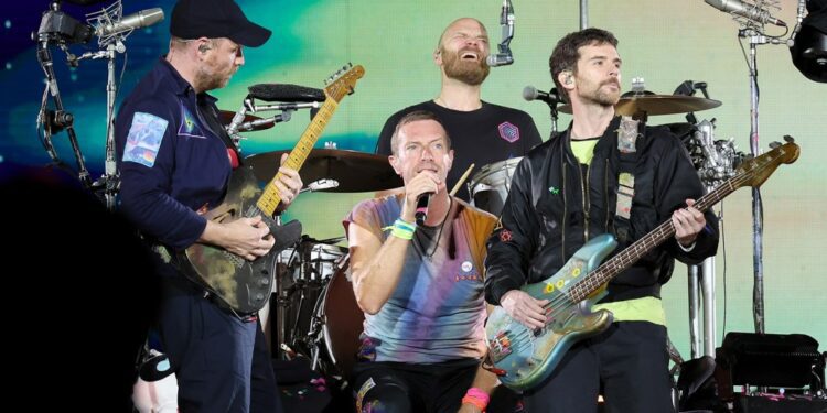 Jonny Buckland, Chris Martin, Will Champion and Guy Berryman of Coldplay