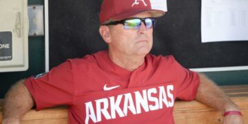 Jun 27, 2018; Omaha, NE, USA; Arkansas Razorbacks head coach Dave Van Horn watches from the dugout prior to game two of the championship series of the College World Series against the Oregon State Beavers at TD Ameritrade Park. Mandatory Credit: Steven Branscombe-USA TODAY Sports