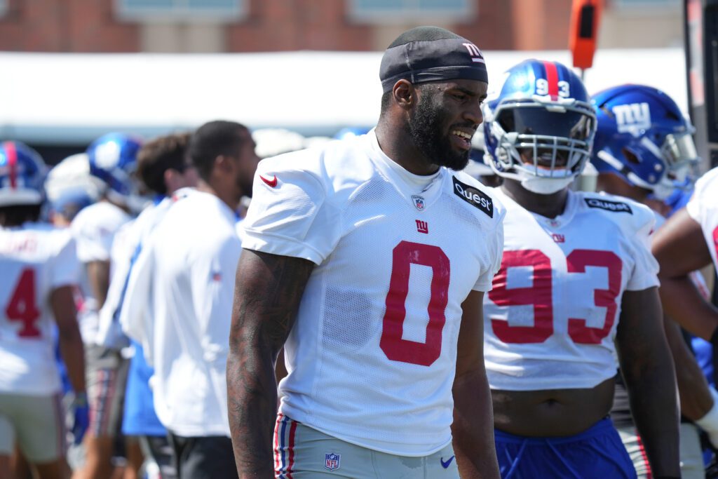 Jul 26, 2024; East Rutherford, NJ, USA; New York Giants linebacker Brian Burns (0) walks the sideline during training camp at Quest Diagnostics Training Center. Mandatory Credit: Lucas Boland-USA TODAY Sports