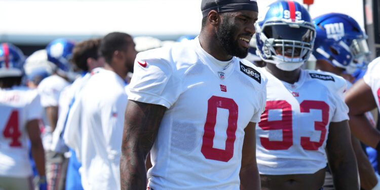 Jul 26, 2024; East Rutherford, NJ, USA; New York Giants linebacker Brian Burns (0) walks the sideline during training camp at Quest Diagnostics Training Center. Mandatory Credit: Lucas Boland-USA TODAY Sports