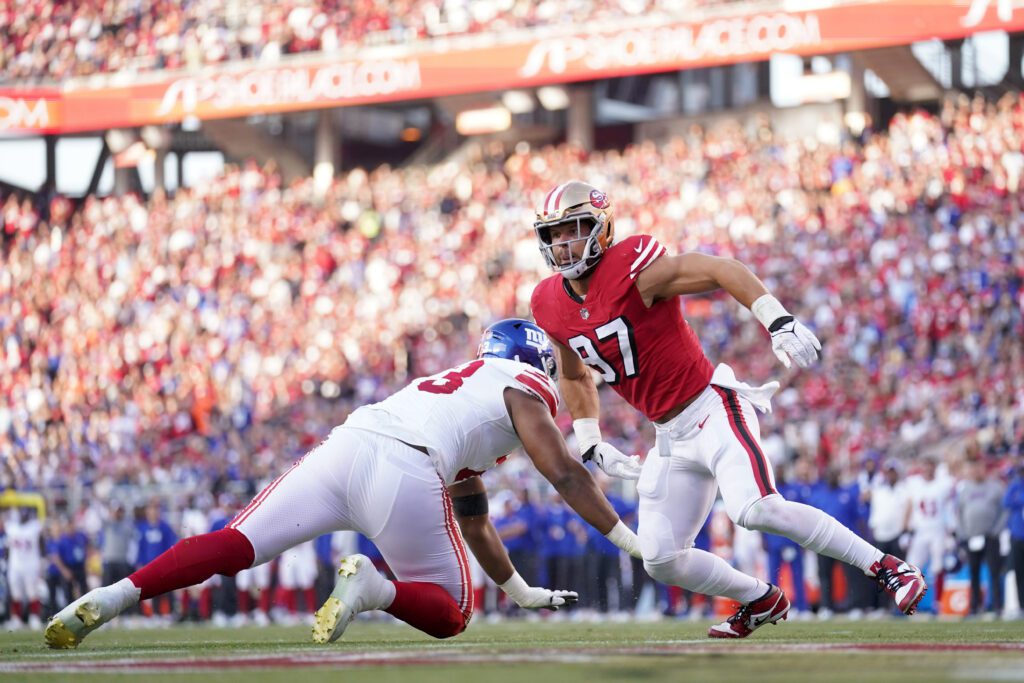 Sep 21, 2023; Santa Clara, California, USA; San Francisco 49ers defensive end Nick Bosa (97) attempts to run past New York Giants offensive tackle Evan Neal (73) in the second quarter at Levi's Stadium. Mandatory Credit: Cary Edmondson-USA TODAY Sports