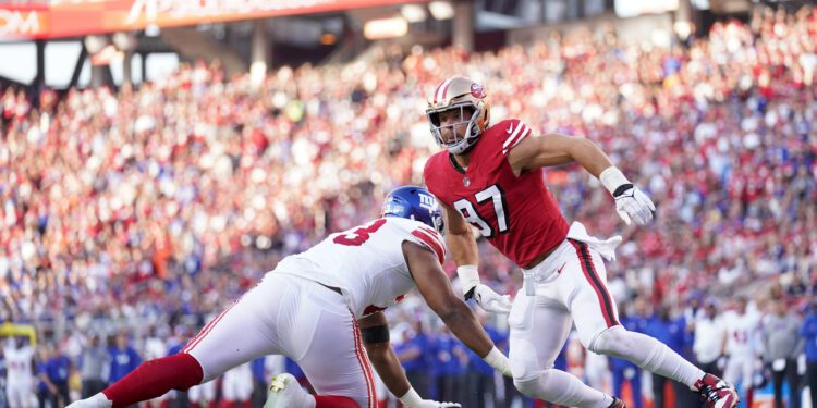 Sep 21, 2023; Santa Clara, California, USA; San Francisco 49ers defensive end Nick Bosa (97) attempts to run past New York Giants offensive tackle Evan Neal (73) in the second quarter at Levi's Stadium. Mandatory Credit: Cary Edmondson-USA TODAY Sports