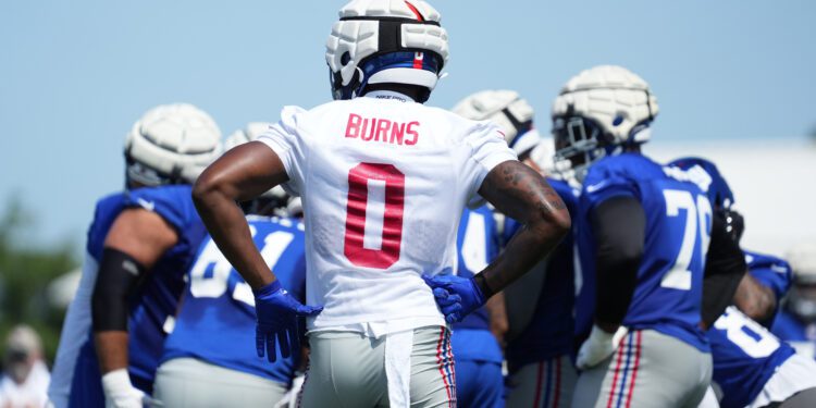 Jul 26, 2024; East Rutherford, NJ, USA; New York Giants linebacker Brian Burns (0) looks on during training camp at Quest Diagnostics Training Center. Mandatory Credit: Lucas Boland-USA TODAY Sports