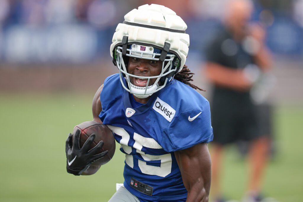 Jul 24, 2024; East Rutherford, NJ, USA; New York Giants running back Dante Miller (25) carries the ball during training camp at Quest Diagnostics Training Facility. Mandatory Credit: Vincent Carchietta-USA TODAY Sports