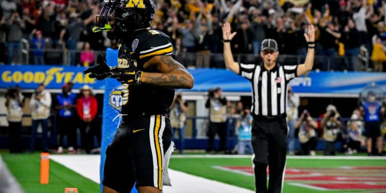 Dec 29, 2023; Arlington, TX, USA; Missouri Tigers wide receiver Luther Burden III (3) celebrates after he catches a pass for a touchdown against the Ohio State Buckeyes during the fourth quarter at AT&T Stadium. Mandatory Credit: Jerome Miron-USA TODAY Sports