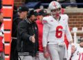 Nov 25, 2023; Ann Arbor, Michigan, USA; Ohio State Buckeyes head coach Ryan Day talks to quarterback Kyle McCord (6) on the sideline during the second half of the NCAA football game against the Michigan Wolverines at Michigan Stadium. Ohio State lost 30-24.