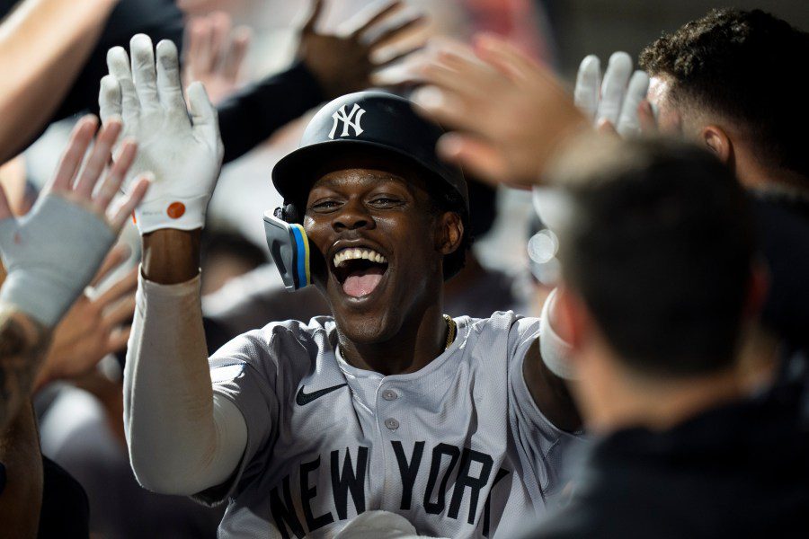 New York Yankees' Jazz Chisholm celebrates after his home run during the ninth inning of a baseball game against the Philadelphia Phillies, Monday, July 29, 2024, in Philadelphia. (AP Photo/Chris Szagola)