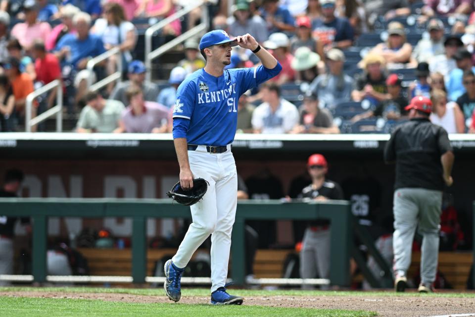 Jun 15, 2024; Omaha, NE, USA; Kentucky Wildcats starting pitcher Trey Pooser (51) walks off the field against the NC State Wolfpack after the fifth inning at Charles Schwab Filed Omaha. Mandatory Credit: Steven Branscombe-USA TODAY Sports