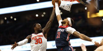 Jan 6, 2024; Washington, District of Columbia, USA; Washington Wizards center Daniel Gafford (21) blocks the shot of New York Knicks forward Julius Randle (30) in the second quarter at Capital One Arena. Mandatory Credit: Geoff Burke-USA TODAY Sports