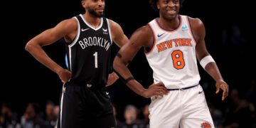 Jan 23, 2024; Brooklyn, New York, USA; Brooklyn Nets forward Mikal Bridges (1) talks to New York Knicks forward OG Anunoby (8) during the first quarter at Barclays Center. Mandatory Credit: Brad Penner-USA TODAY Sports