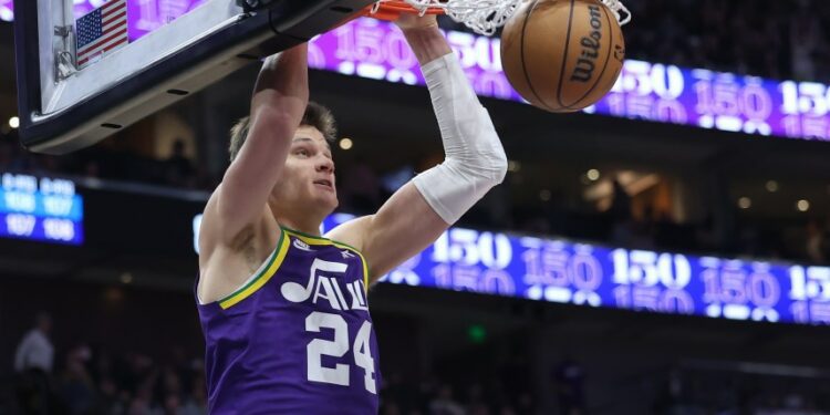 Dec 13, 2023; Salt Lake City, Utah, USA; Utah Jazz center Walker Kessler (24) dunks the ball against the New York Knicks during the third quarter at Delta Center. Mandatory Credit: Rob Gray-USA TODAY Sports