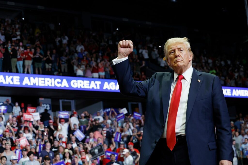 Donald Trump walks off stage after speaking at a campaign rally on July 20, in Grand Rapids, Michigan.