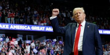 Donald Trump walks off stage after speaking at a campaign rally on July 20, in Grand Rapids, Michigan.