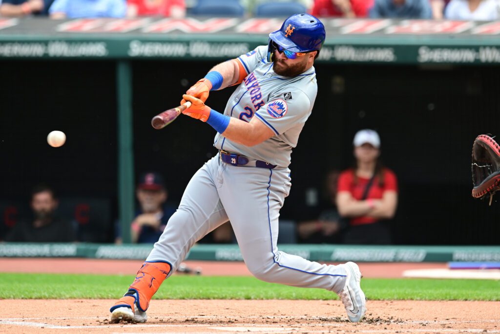 May 22, 2024; Cleveland, Ohio, USA; New York Mets right fielder DJ Stewart (29) hits a single during the first inning against the Cleveland Guardians at Progressive Field. Mandatory Credit: Ken Blaze-USA TODAY Sports