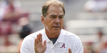 Nick Saban in an Alabama shirt