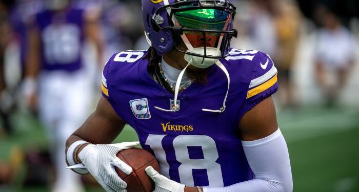 Oct 1, 2023; Charlotte, North Carolina, USA; Minnesota Vikings wide receiver Justin Jefferson (18) warms up before the game at Bank of America Stadium.