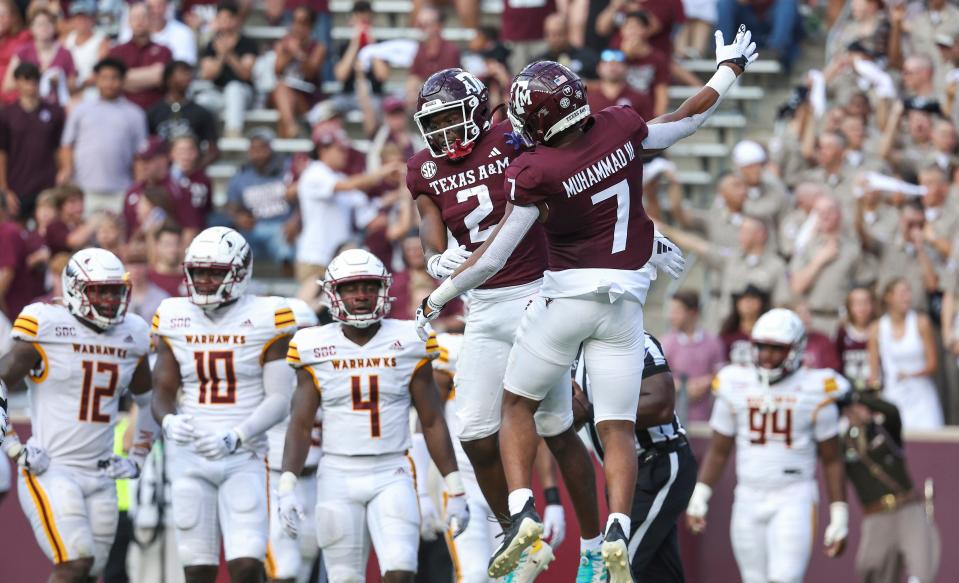 Sep 16, 2023; College Station, Texas; Texas A&M Aggies running back Rueben Owens (2) celebrates with wide receiver Moose Muhammad III (7) after scoring a touchdown during the third quarter against the Louisiana Monroe Warhawks at Kyle Field. Troy Taormina-USA TODAY Sports