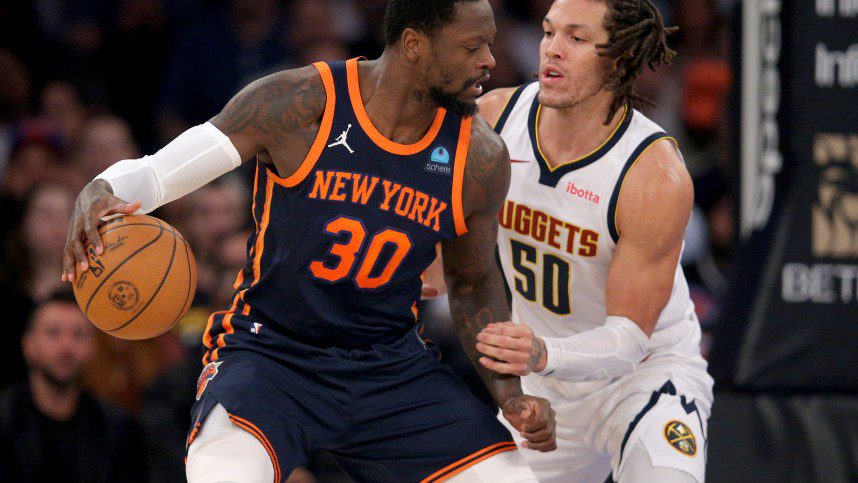 Jan 25, 2024; New York, New York, USA; New York Knicks forward Julius Randle (30) controls the ball against Denver Nuggets forward Aaron Gordon (50) during the first quarter at Madison Square Garden. Mandatory Credit: Brad Penner-USA TODAY Sports