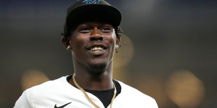 Miami Marlins' Jazz Chisholm Jr. walks from the field to the dugout during the seventh inning of a baseball game against the New York Mets, Monday, July 22, 2024, in Miami. (AP Photo/Lynne Sladky)