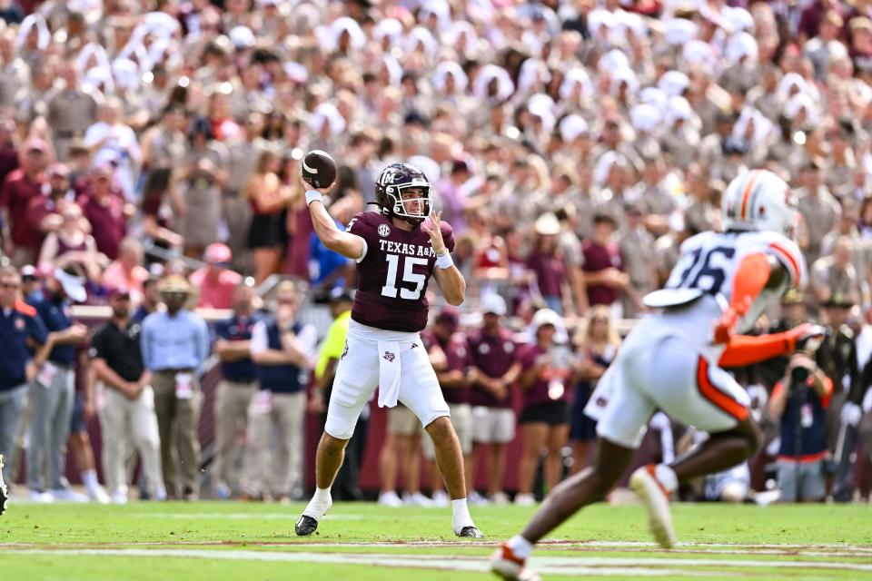 Sep 23, 2023; College Station, Texas; Texas A&M Aggies quarterback Conner Weigman (15) throws a pass durning the first quarter against the Auburn Tigers at Kyle Field. Maria Lysaker-USA TODAY Sports