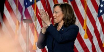 U.S. Vice President Kamala Harris applauds during a campaign event at West Allis Central High School, in West Allis, Wisconsin, U.S., July 23, 2024