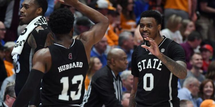 Mar 15, 2024; Nashville, TN, USA; Mississippi State Bulldogs forward D.J. Jeffries (0) and guard Josh Hubbard (13) celebrate at the end of the half against the Tennessee Volunteers at Bridgestone Arena. Mandatory Credit: Christopher Hanewinckel-USA TODAY Sports Christopher Hanewinckel/USA TODAY NETWORK