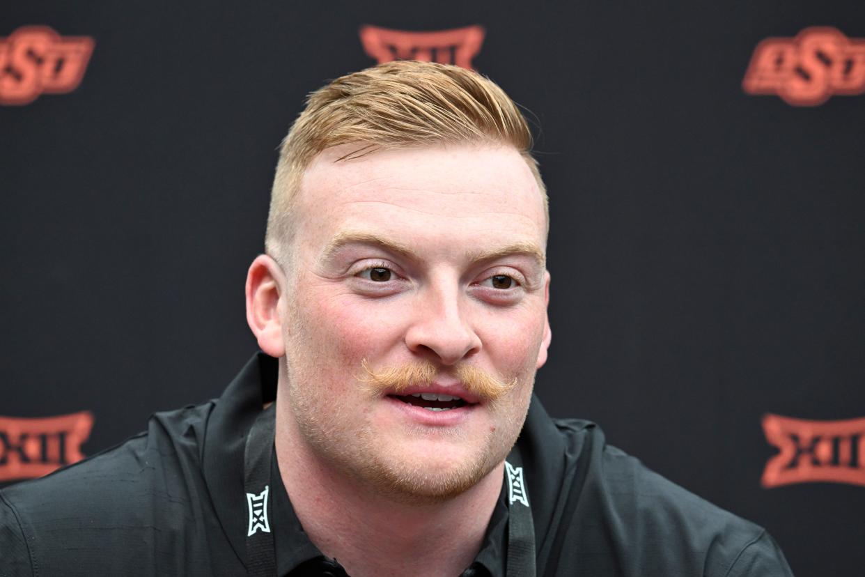 Jul 9, 2024; Las Vegas, NV, USA; Oklahoma State quarterback Alan Bowman speaks to the media during the Big 12 Media Days at Allegiant Stadium. Mandatory Credit: Candice Ward-USA TODAY Sports