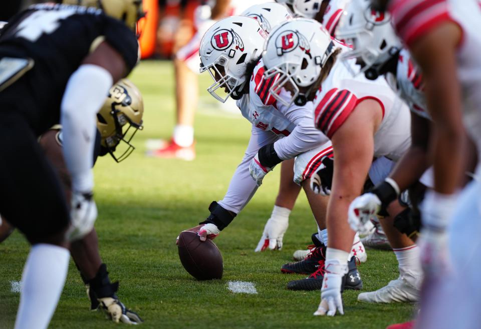 Nov 26, 2022; Boulder, Colorado, USA; Utah Utes offensive lineman Paul Maile (54) lines up across from the Colorado Buffaloes in the first quarter at Folsom Field. Mandatory Credit: Ron Chenoy-USA TODAY Sports