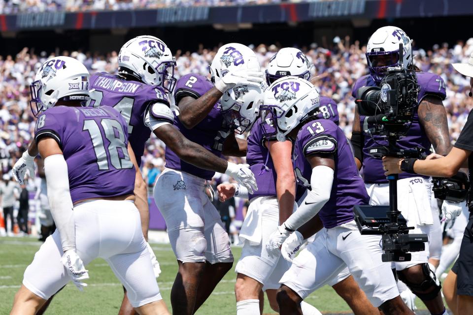 Sep 2, 2023; Fort Worth, Texas, USA; TCU Horned Frogs quarterback Chandler Morris (4) celebrates scoring a touchdown in the fourth quarter with his teammates against the Colorado Buffaloes at Amon G. Carter Stadium. Mandatory Credit: Tim Heitman-USA TODAY Sports