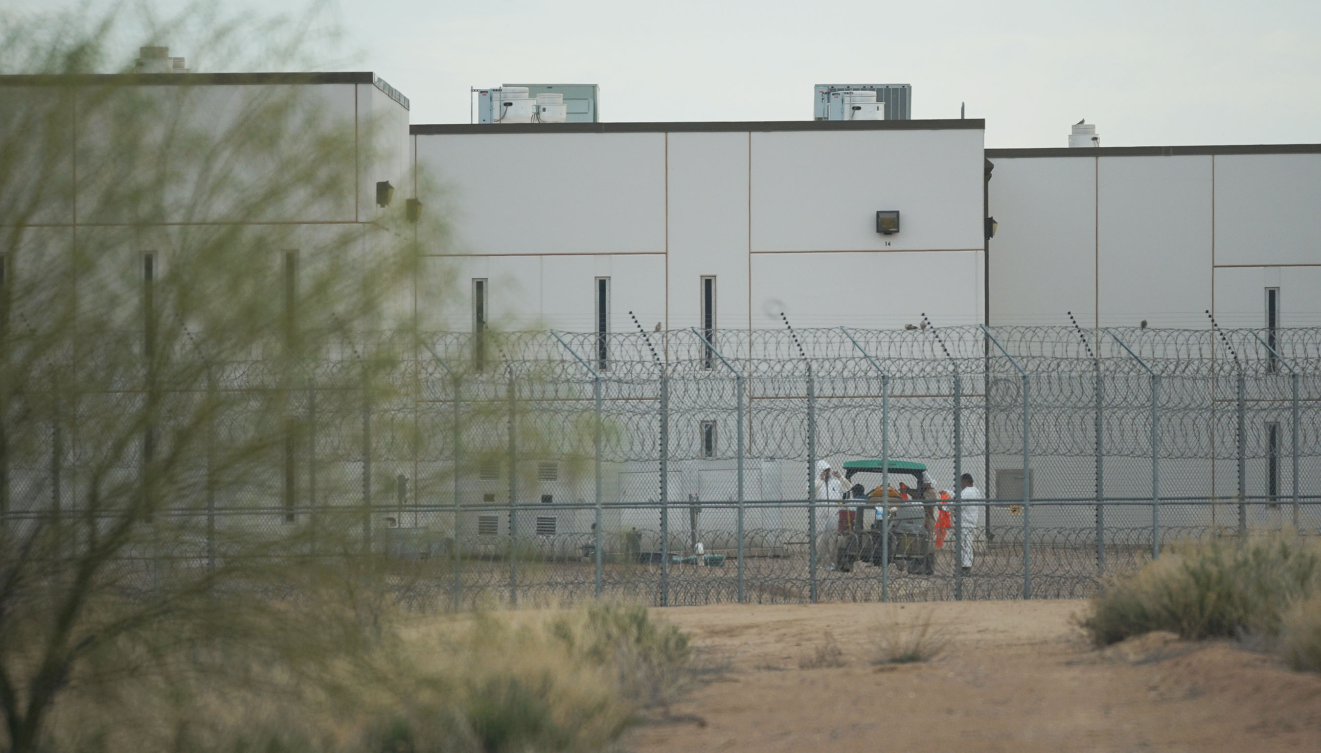 Saguaro Correctional Facility, Eloy, Arizona with workers. Not quite sure if these are prisoners or security personnel. 6 march 2016. photograph Cory Lum/Civil Beat