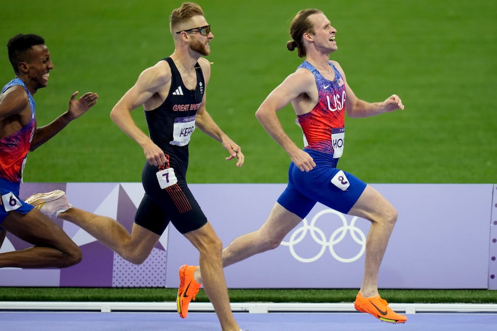 Cole Hocker, of the United States, right, competes in the men's 1500-meters final at the 2024...