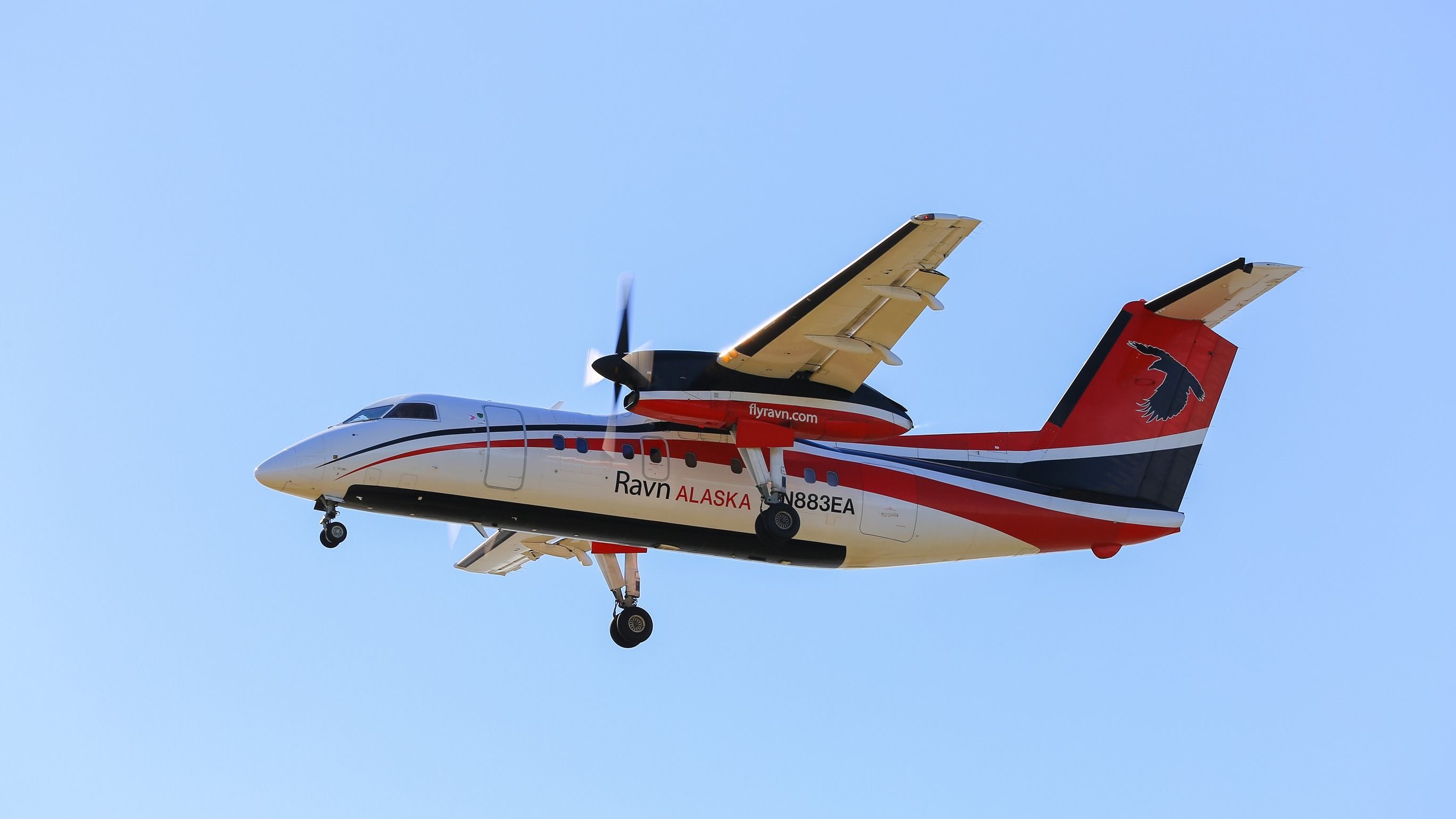 Ravn Alaska DHC-8-100 landing at Ted Stevens International Airport ANC shutterstock_670521511