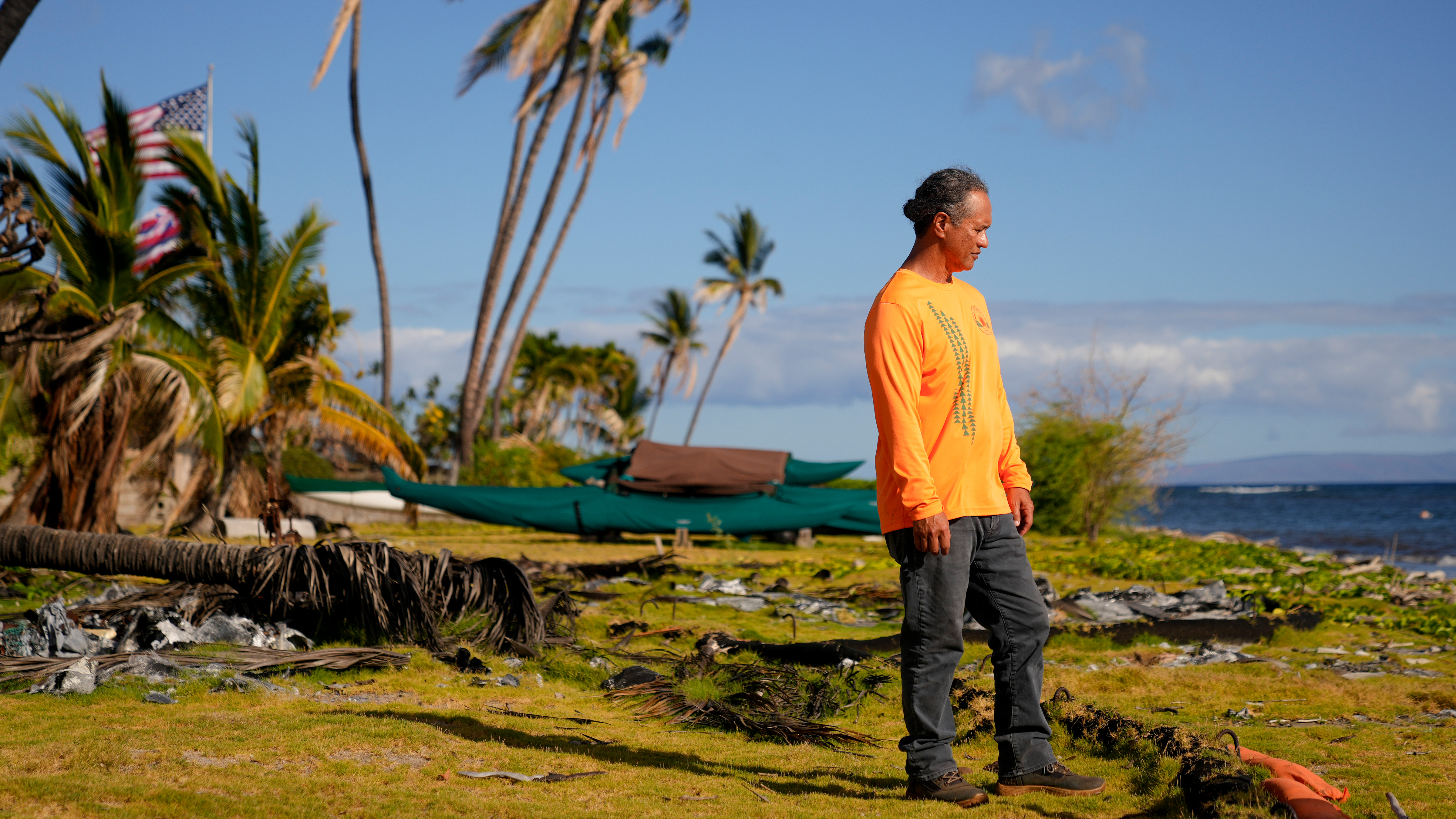 Ekolu Lindsey, who lost the waterfront home where his family has lived for five generations during the August 2023 wildfires, stands for a photo on Saturday, July 6, 2024, in Lahaina, Hawaii.