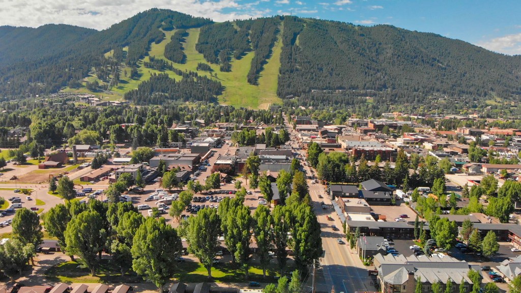 Aerial view of Jackson Hole, Wyoming, featuring the town and landscape on a beautiful summer morning