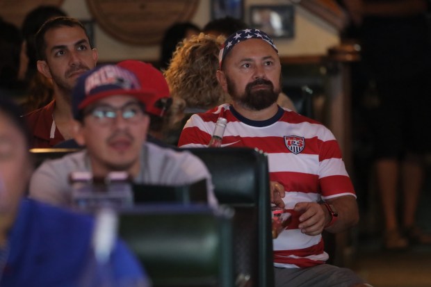 Fans attend an Olympics viewing party at Legends Sports Bar...