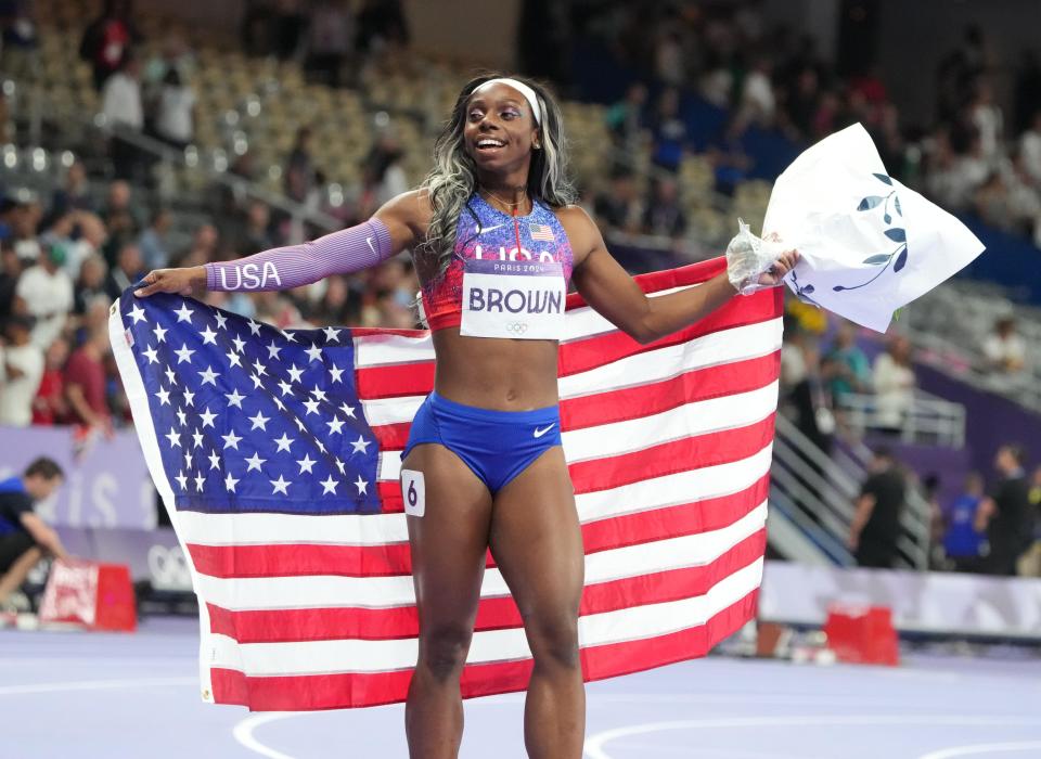 Aug 6, 2024; Saint-Denis, FRANCE; Brittany Brown (USA) celebrates her third place finish in the women's 200m final during the Paris 2024 Olympic Summer Games at Stade de France. Mandatory Credit: Kirby Lee-USA TODAY Sports