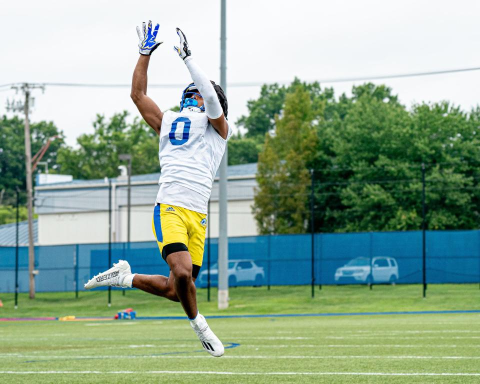 Rutgers transfer Max Patterson gets set to snare a pass at Delaware practice.