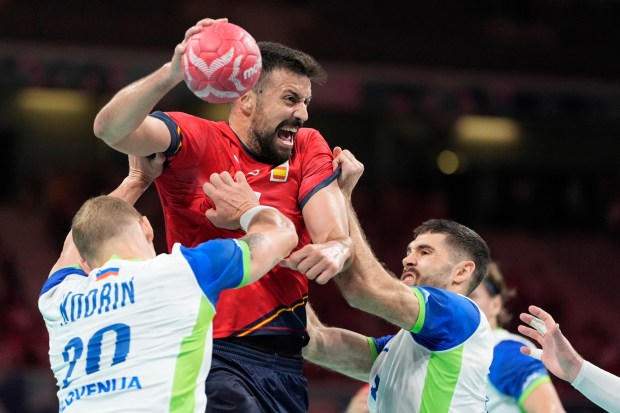 Spain's Agustin Casado is in action during the bronze medal handball match between Spain and Slovenia at the 2024 Summer Olympics, Sunday, Aug. 11, 2024, in Villeneuve-d'Ascq, France. (AP Photo/Aaron Favila)