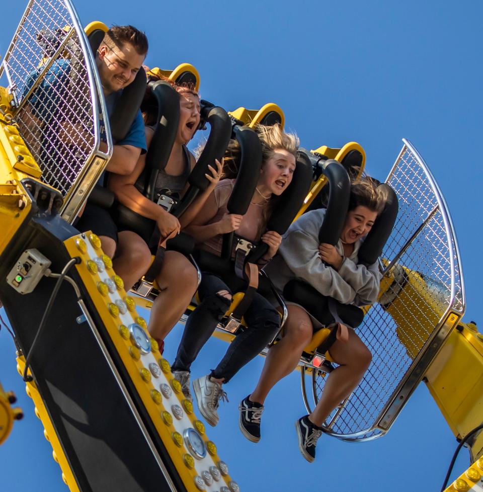 Attendees enjoy a ride at the Wilson County Fair Thursday, Aug 18, 2022; Lebanon, Tennessee, United States;  Mandatory Credit: Alan Poizner-The Tennessean