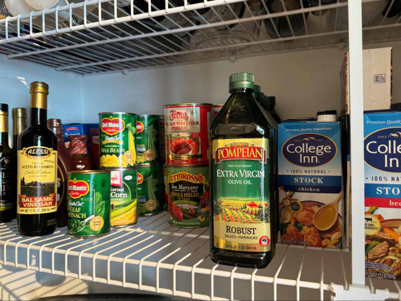 view of pantry shelves with pantry goods