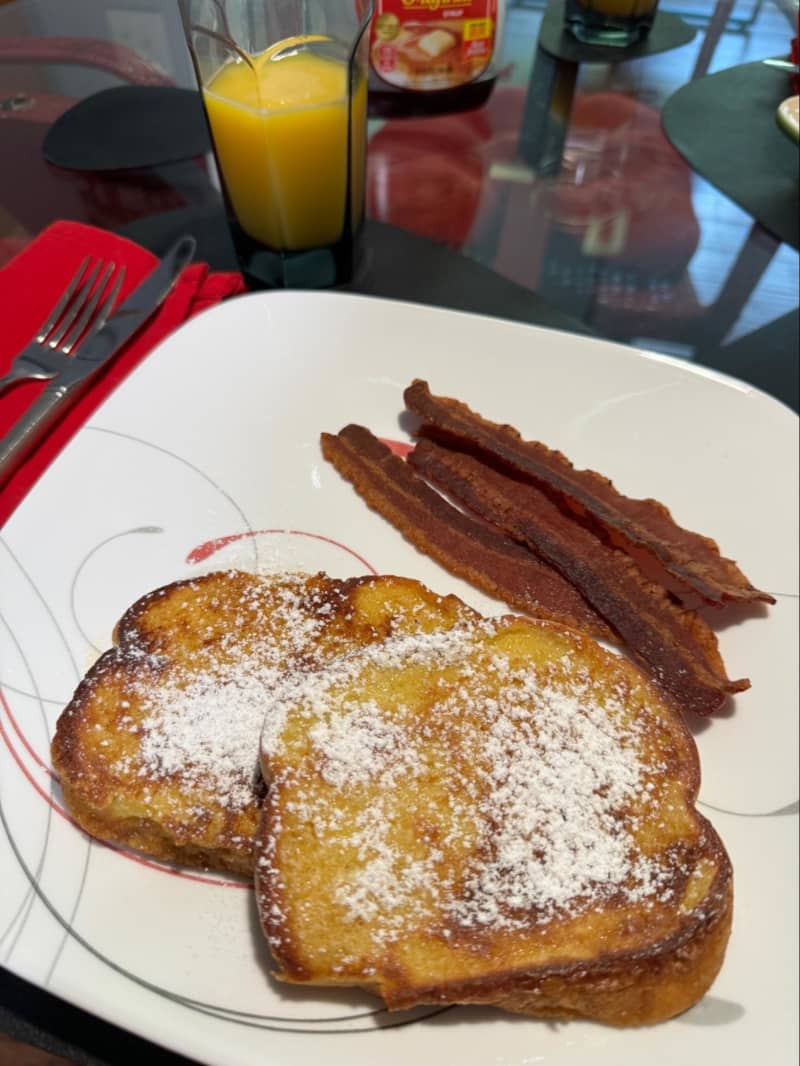 French toast with crispy bacon and orange juice