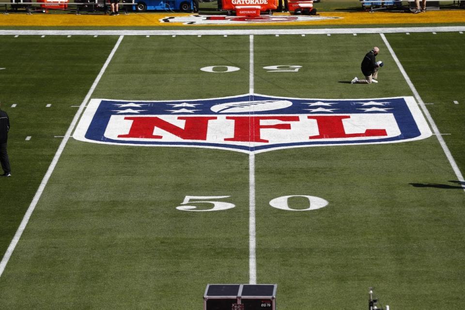 Feb 7, 2020; Tampa, FL, USA; General view of the NFL Shield logo on the field before Super Bowl LV between the Tampa Bay Buccaneers and the Kansas City Chiefs at Raymond James Stadium. Mandatory Credit: Kim Klement-USA TODAY Sports