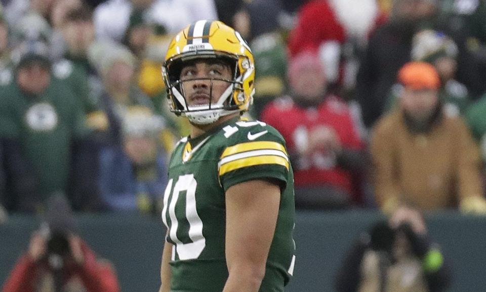 Dec 17, 2023; Green Bay, Wisconsin, USA; Tampa Bay Buccaneers defensive end Logan Hall (90) smiles as he walks off the field after recovering a fumble by Green Bay Packers quarterback Jordan Love (10) late in the fourth quarter at Lambeau Field. Mandatory Credit: Dan Powers-USA TODAY Sports