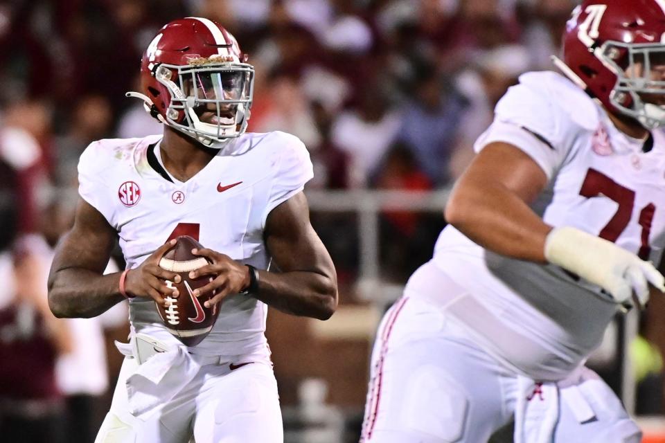 Sep 30, 2023; Starkville, Mississippi, USA;Alabama Crimson Tide quarterback Jalen Milroe (4) looks to pass against the Mississippi State Bulldogs during the second half at Davis Wade Stadium at Scott Field. Mandatory Credit: Matt Bush-USA TODAY Sports