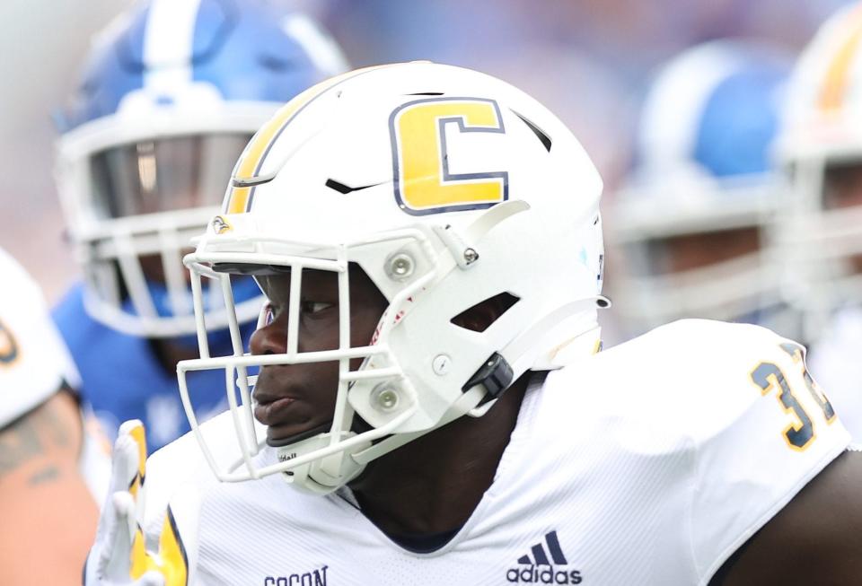 LEXINGTON, KENTUCKY - SEPTEMBER 18: Ailym Ford #23 of the Chattanooga Mocs runs with the ball against the Kentucky Wildcats at Kroger Field on September 18, 2021 in Lexington, Kentucky. (Photo by Andy Lyons/Getty Images)