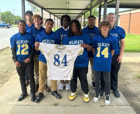 The Columbia High School Wildcats football team display one of their jerseys. (Darren Rhym/Courtesy)