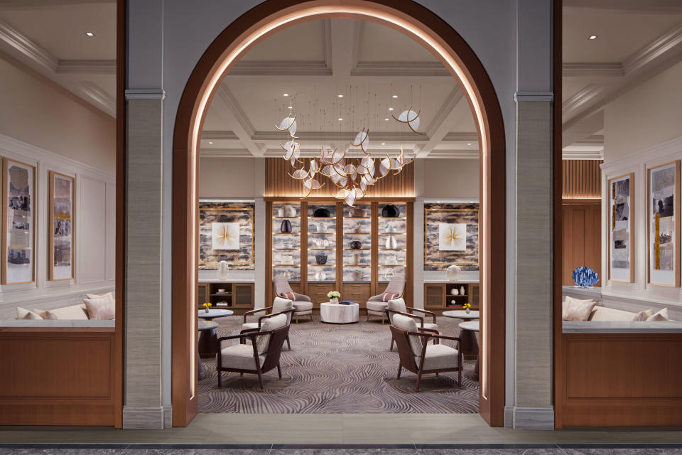 The entrance to the club lounge at The Ritz-Carlton, Naples features a dramatic arch