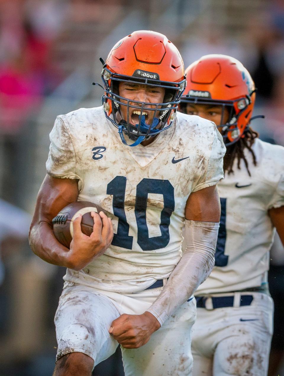 Benjamin's Adam Balogoun-ali celebrates his interception against the Palm Beach Central during their game in Wellington, Florida on October 6, 2023.