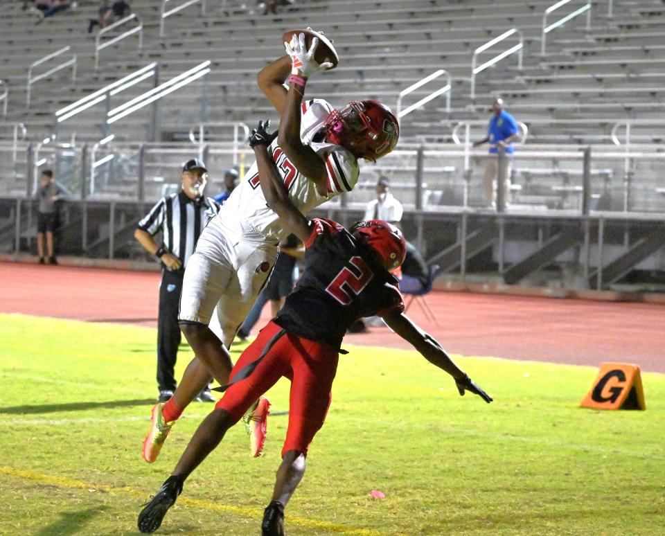 Santaluces' Jamar Browder reaches up to make a touchdown grab during a regional semifinals game on Nov. 17, 2023.