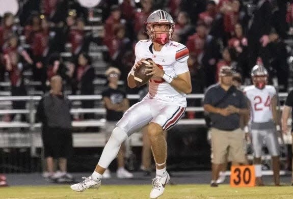 Lake Mary quarterback Noah Grubbs looks downfield.